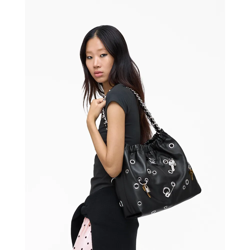 CARTERA MARC JACOBS THE CRISTINA TOTE GROMET CHARM | NEGRO