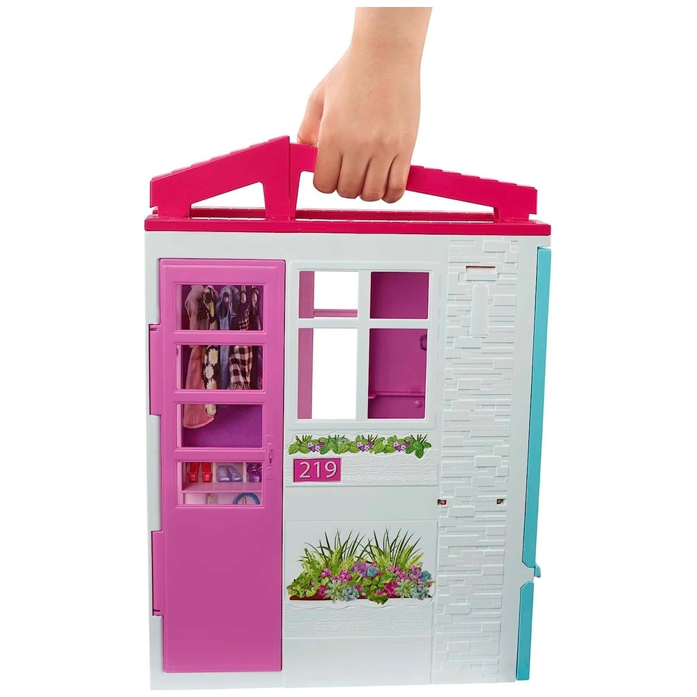 Barbie Casa de muñecas juego portátil de 1 piso con piscina y accesorios