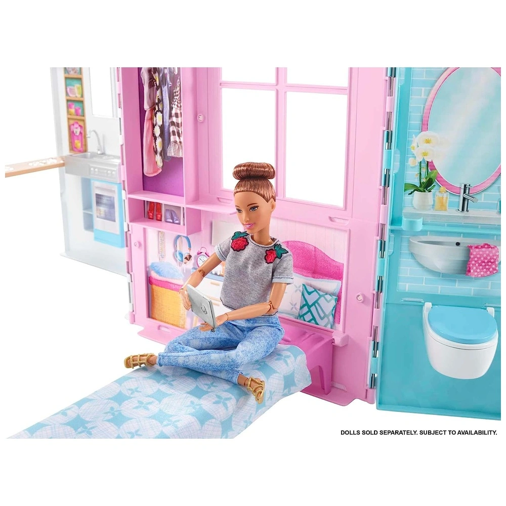 Barbie Casa de muñecas juego portátil de 1 piso con piscina y accesorios