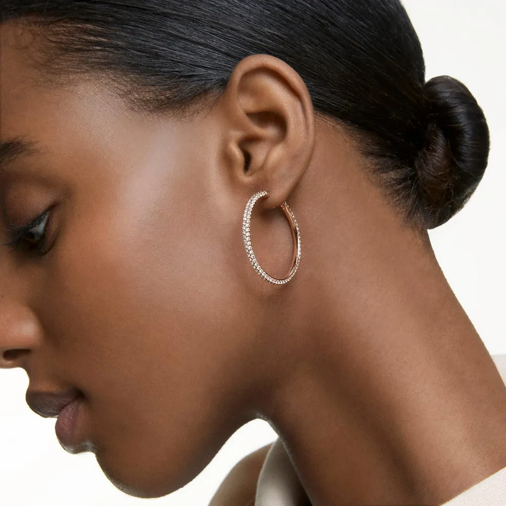 SWAROVSKI ARETES HOOP DEXTERA ACABADO ORO ROSA PARA MUJER | ORO ROSA