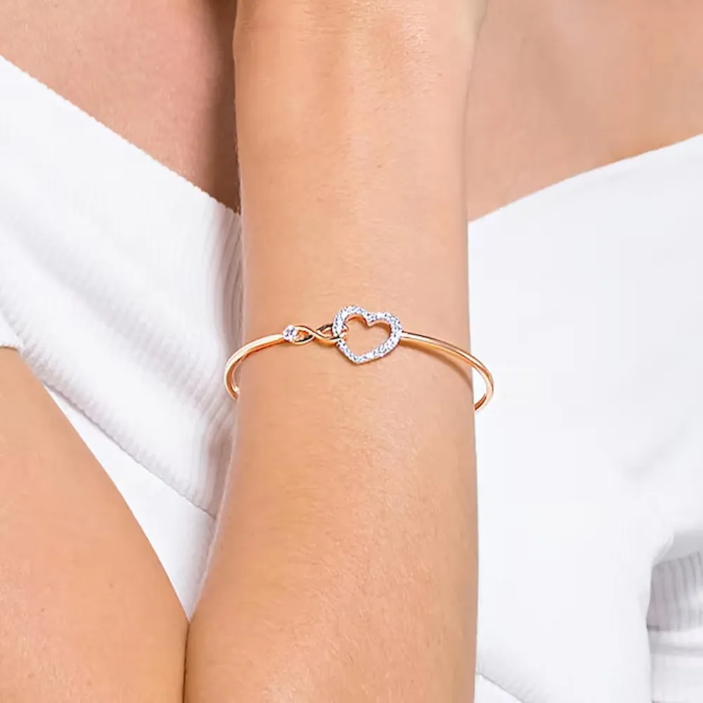 SWAROVSKI PULSERA BANGLE HYPERBOLA ACABADO ORO ROSA PARA MUJER | ORO ROSA