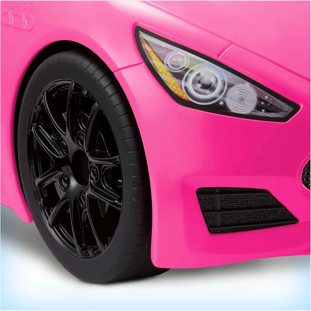 BARBIE COCHE DESCAPOTABLE ROSA RUEDAS GIRATORIAS