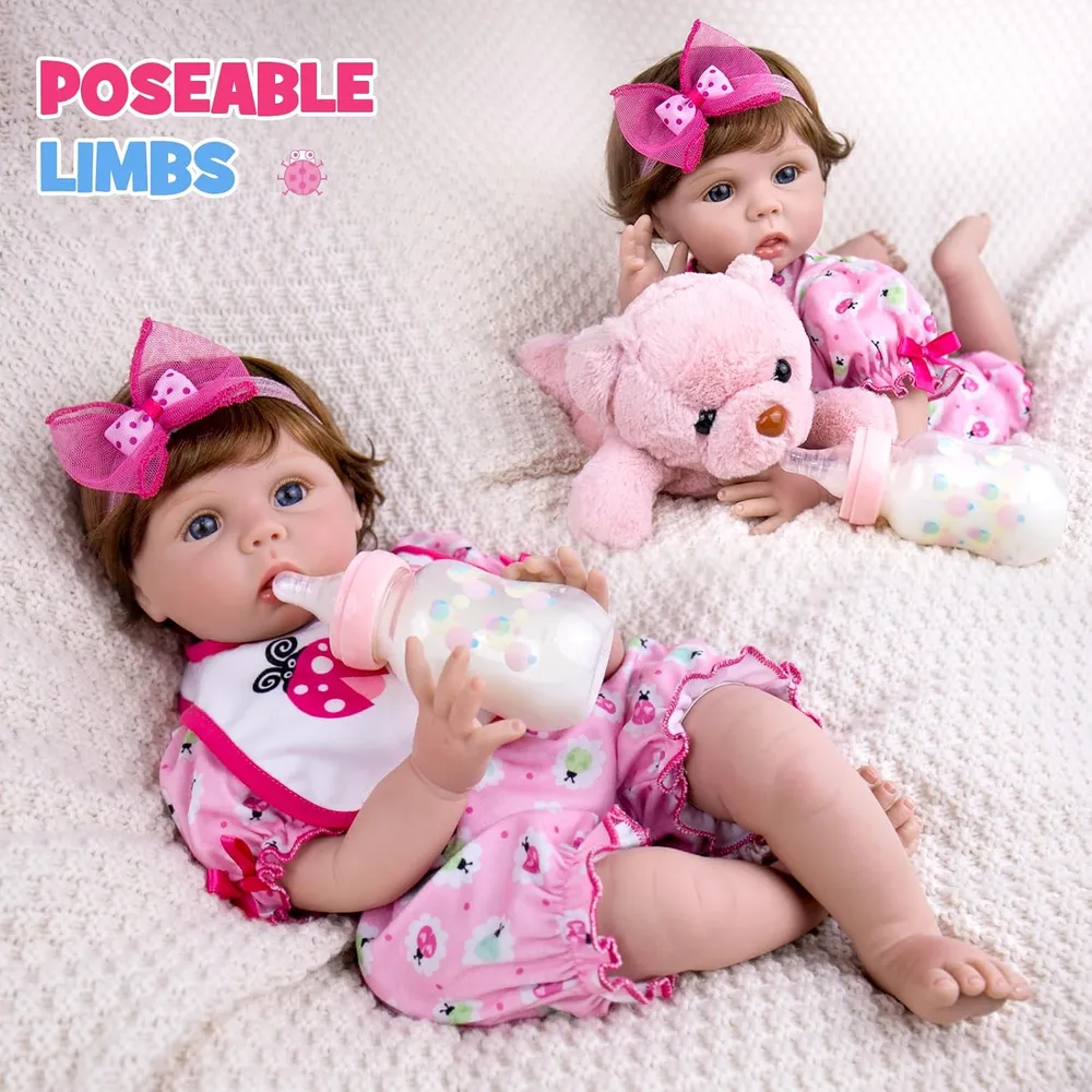 AORI muñeca bebé Realista 22"/56 cm con accesorios | Mariquita rosa
