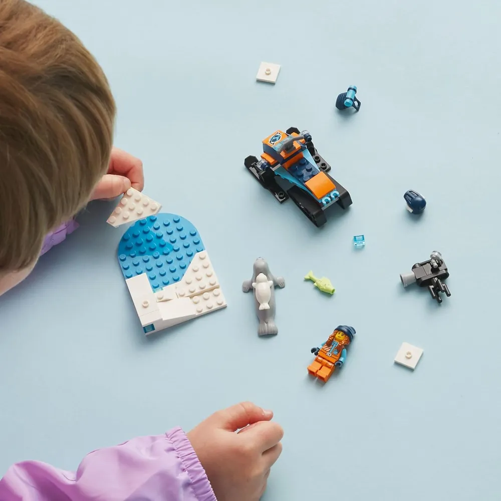 Lego City motonieve exploradora ártica set de construcción con minifiguras y focas