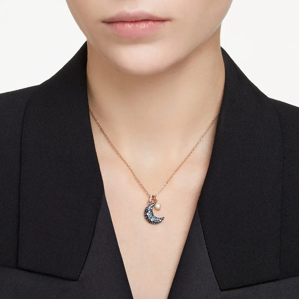 SWAROVSKI COLLAR PENDIENTE LUNA SUBLIMA ACABADO ORO ROSA PARA MUJER | ORO ROSA / AZUL OSCURO