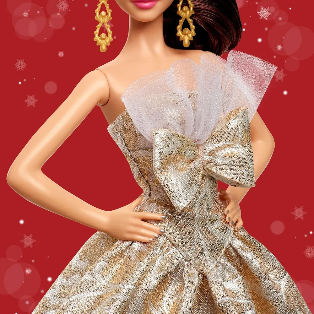 Barbie moda navideña 2025 cabello castaño vestido plateado dorado