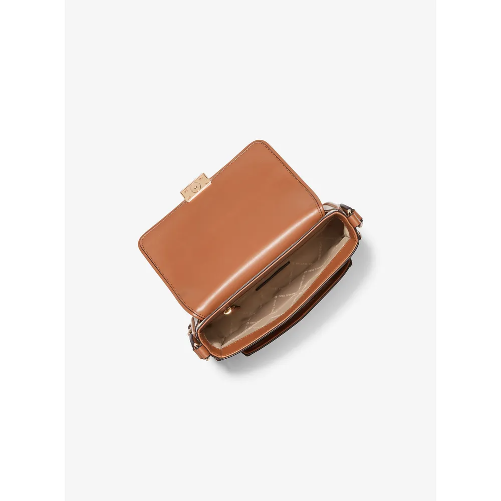 Michael Kors Bolso bandolera de Bradshaw Signature | Vainilla