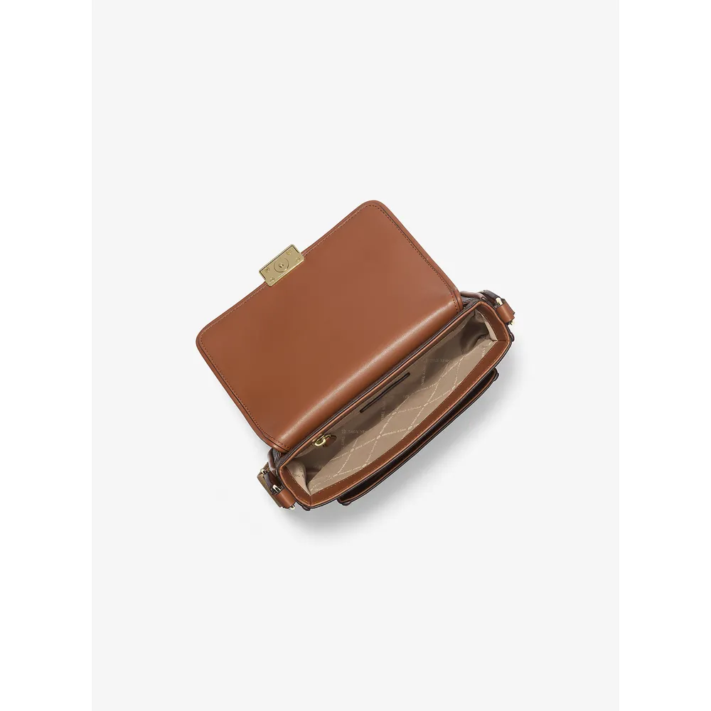 mk785328019_1_webp.webp Michael Kors Bolso bandolera de Bradshaw Signature | Marrón