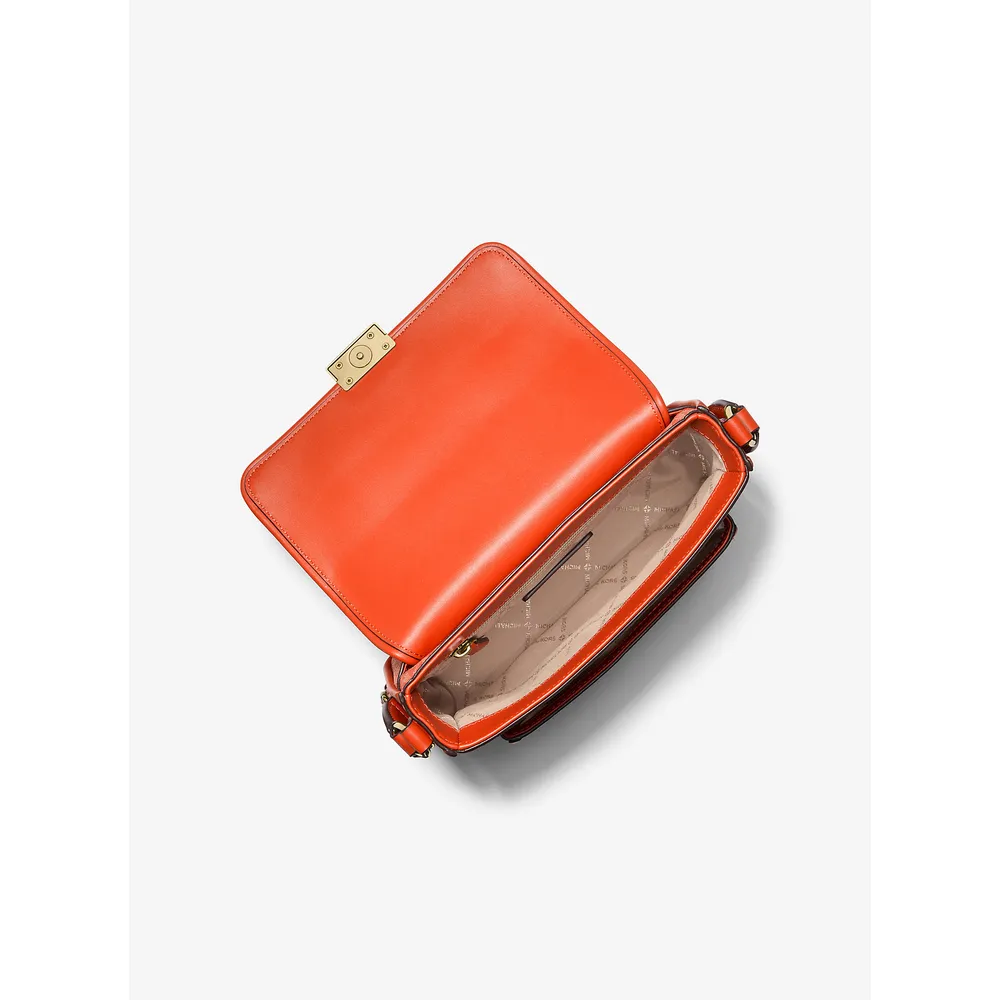 Michael Kors Bolso bandolera de Bradshaw Signature | Red Clay