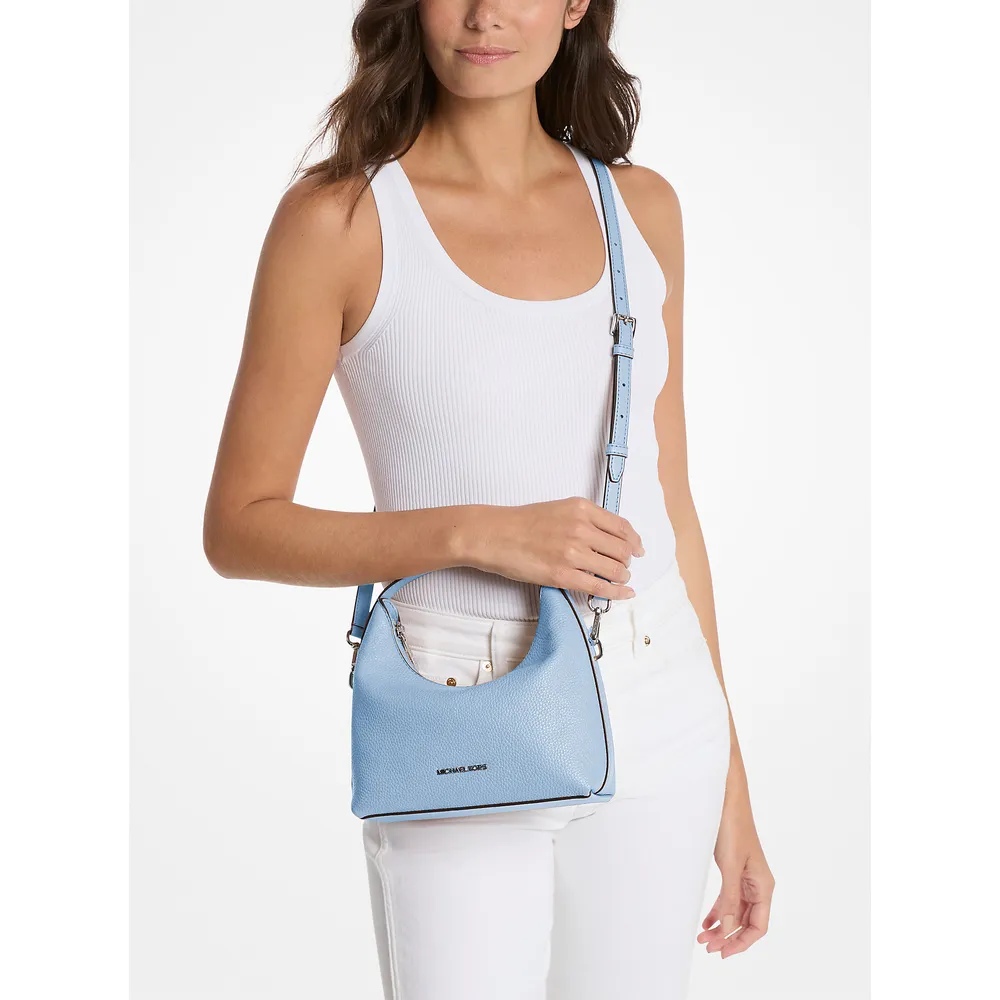 mk785370187_2_webp.webp Michael Kors Bolso bandolera Ember de piel granulada | Cielo claro