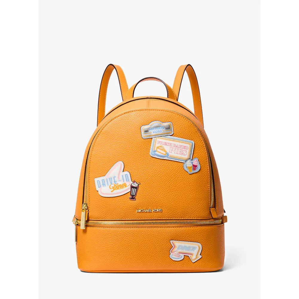 mk785370838_0_webp.webp Michael Kors Mochila adornada Rhea | Pop Naranja
