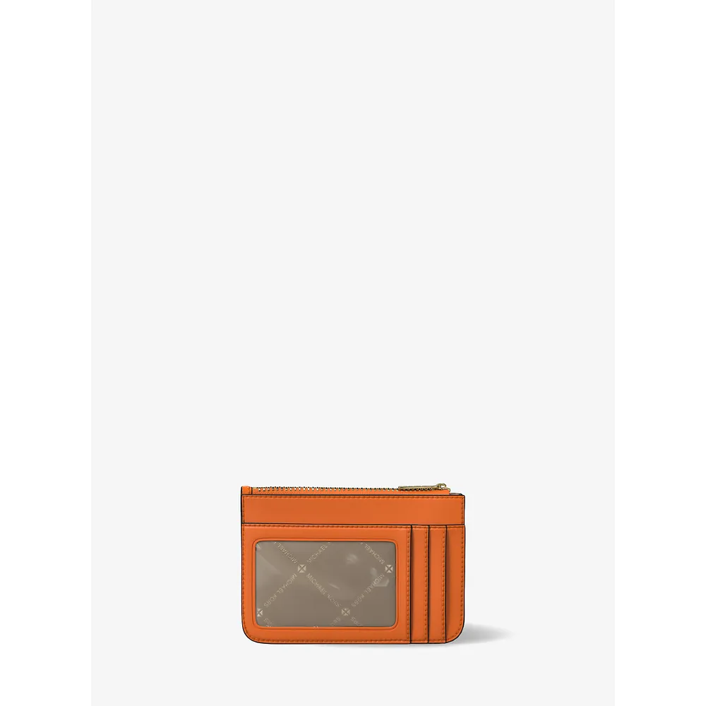 mk785370875_2_webp.webp Michael Kors Monedero de charol Jet Set | Pop Naranja