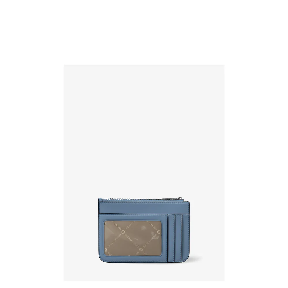 mk785371213_2_webp.webp Michael Kors Monedero de charol Jet Set | Cielo claro
