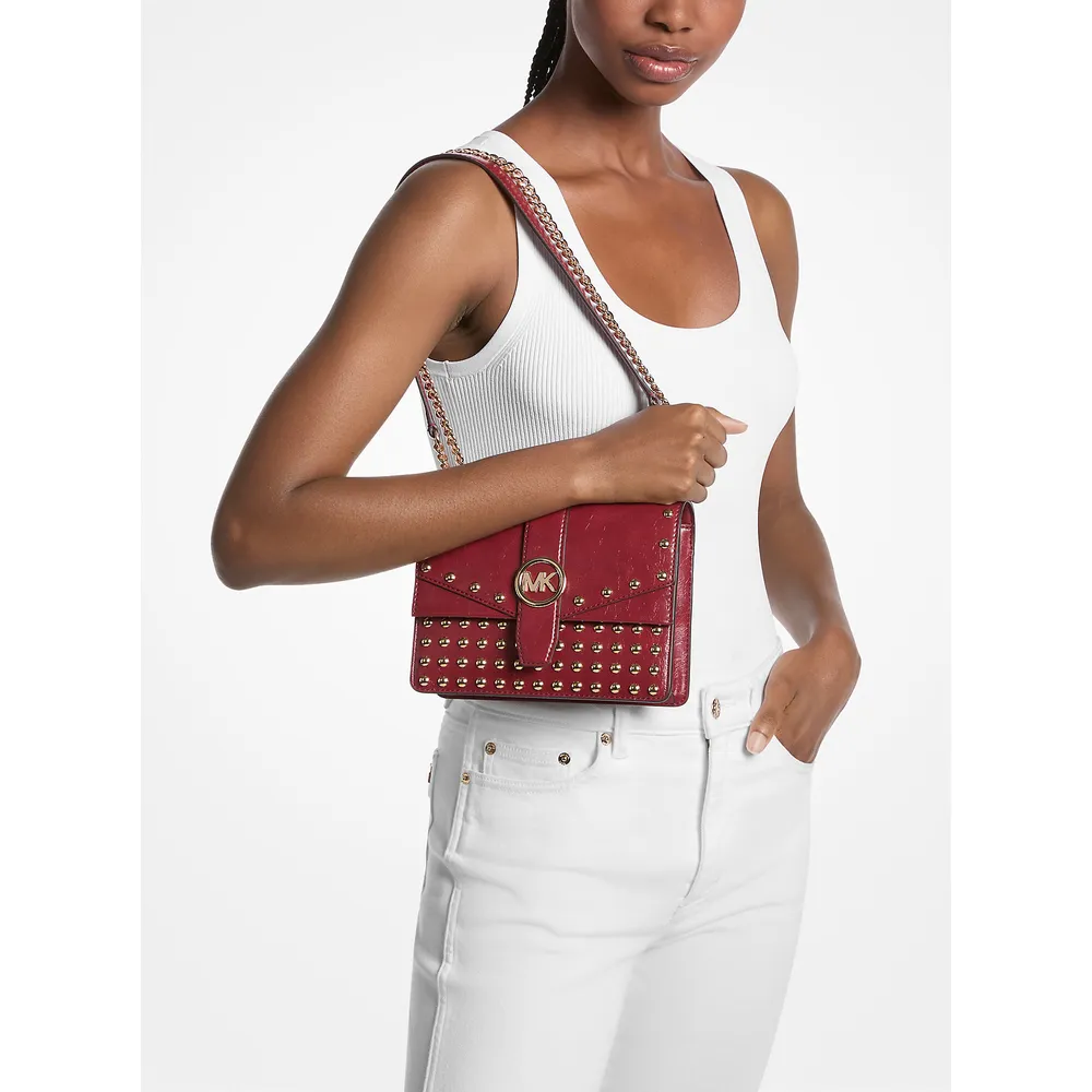 Michael Kors Bolso Greenwich con tachuelas y efecto desgastado | Cereza
