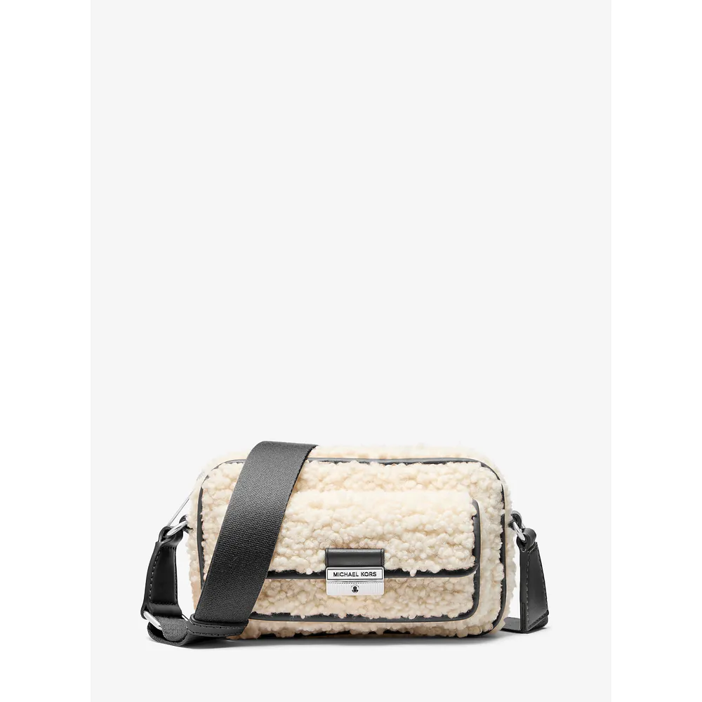 Michael Kors Bolso bandolera Bradshaw para cámara de piel sintética | Negro