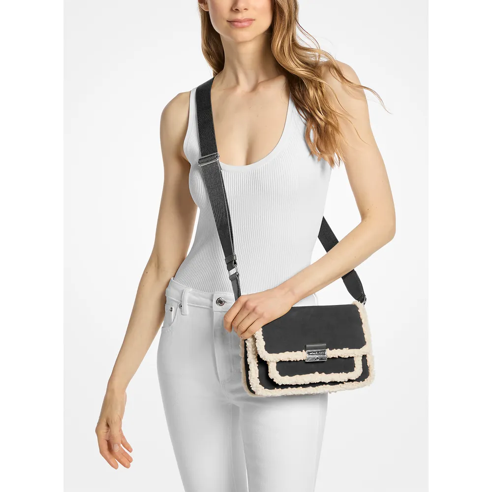 Michael Kors Bolso mensajeroBolso Bradshaw de ante y piel sintética | Negro