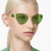 SWAROVSKI LENTES DE SOL MARIPOSA SK7003 57 MM MUJER | GOLD/DARK GREEN