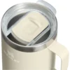 TAZA DE CAMPING STANLEY 710 ML CREMA