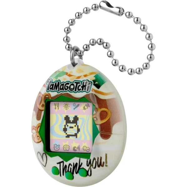 b0gv16pzz8_2.webp TAMAGOTCHI ORIGINAL NUECES DE CARAMELO