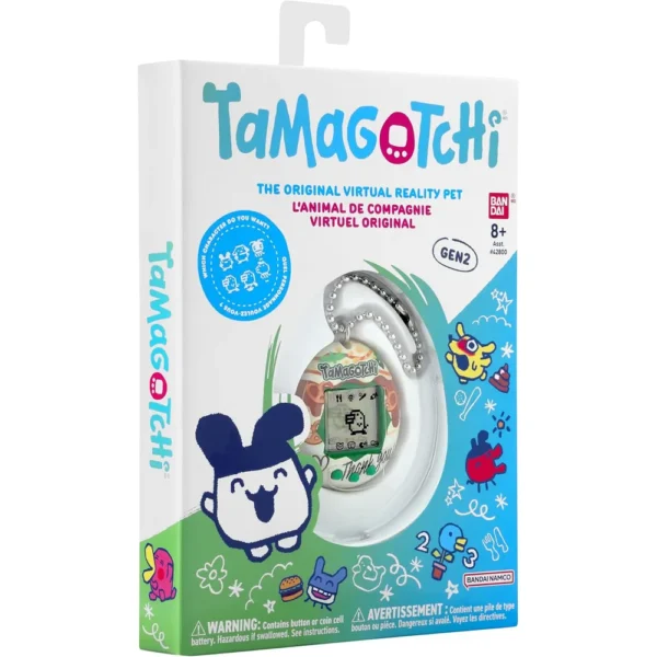 b0gv16pzz8_6.webp TAMAGOTCHI ORIGINAL NUECES DE CARAMELO